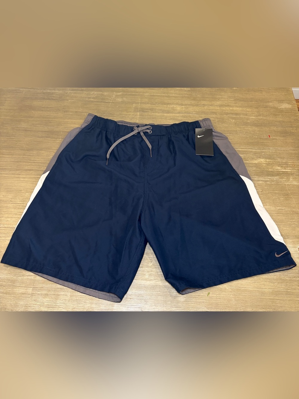 Nike swim trunks navy with gray Waistband and White Side Stripes men’s size XL